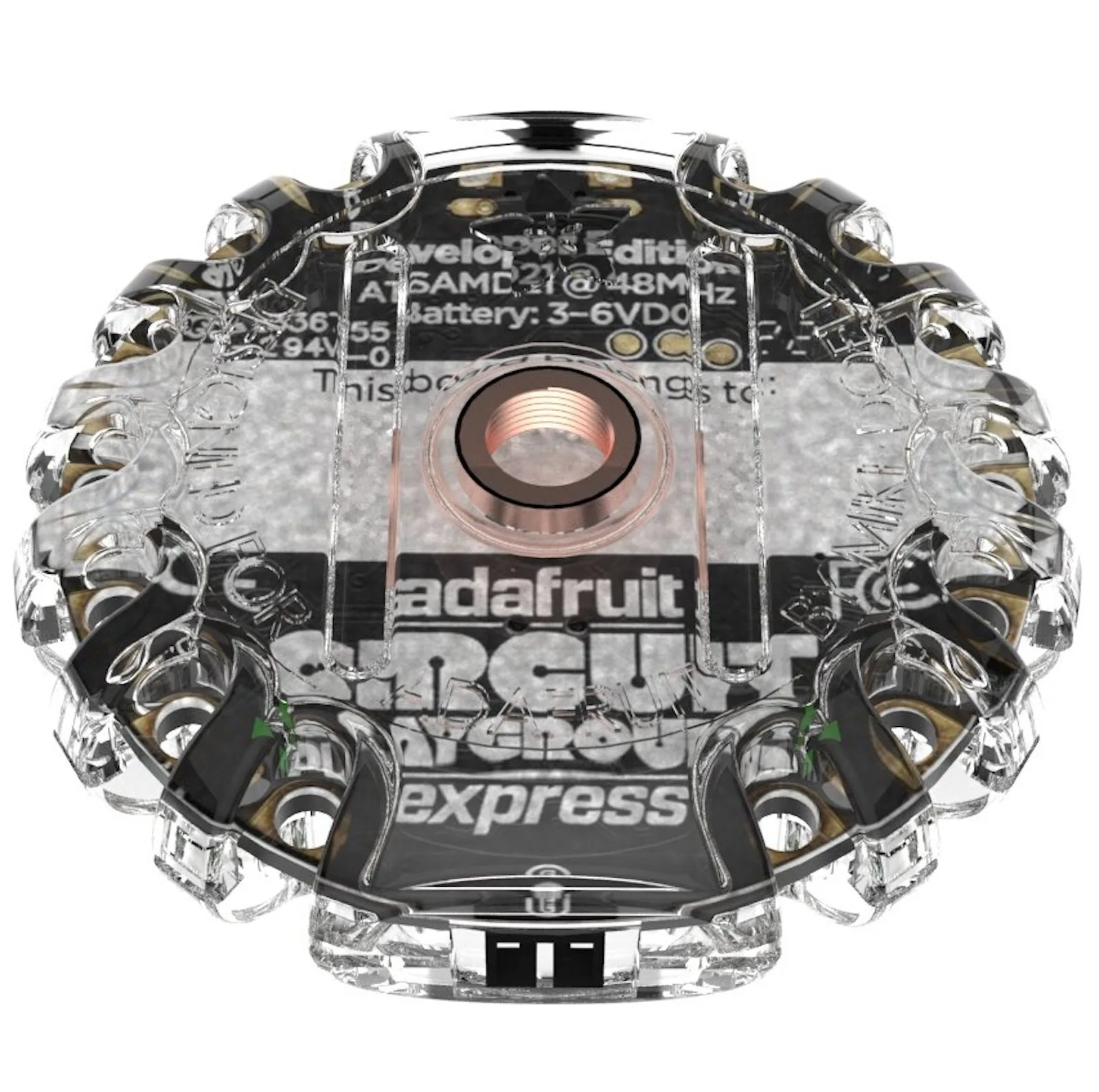 Underside of the board through the clear enclosure, showing the Circuit Playground Express label and brass insert