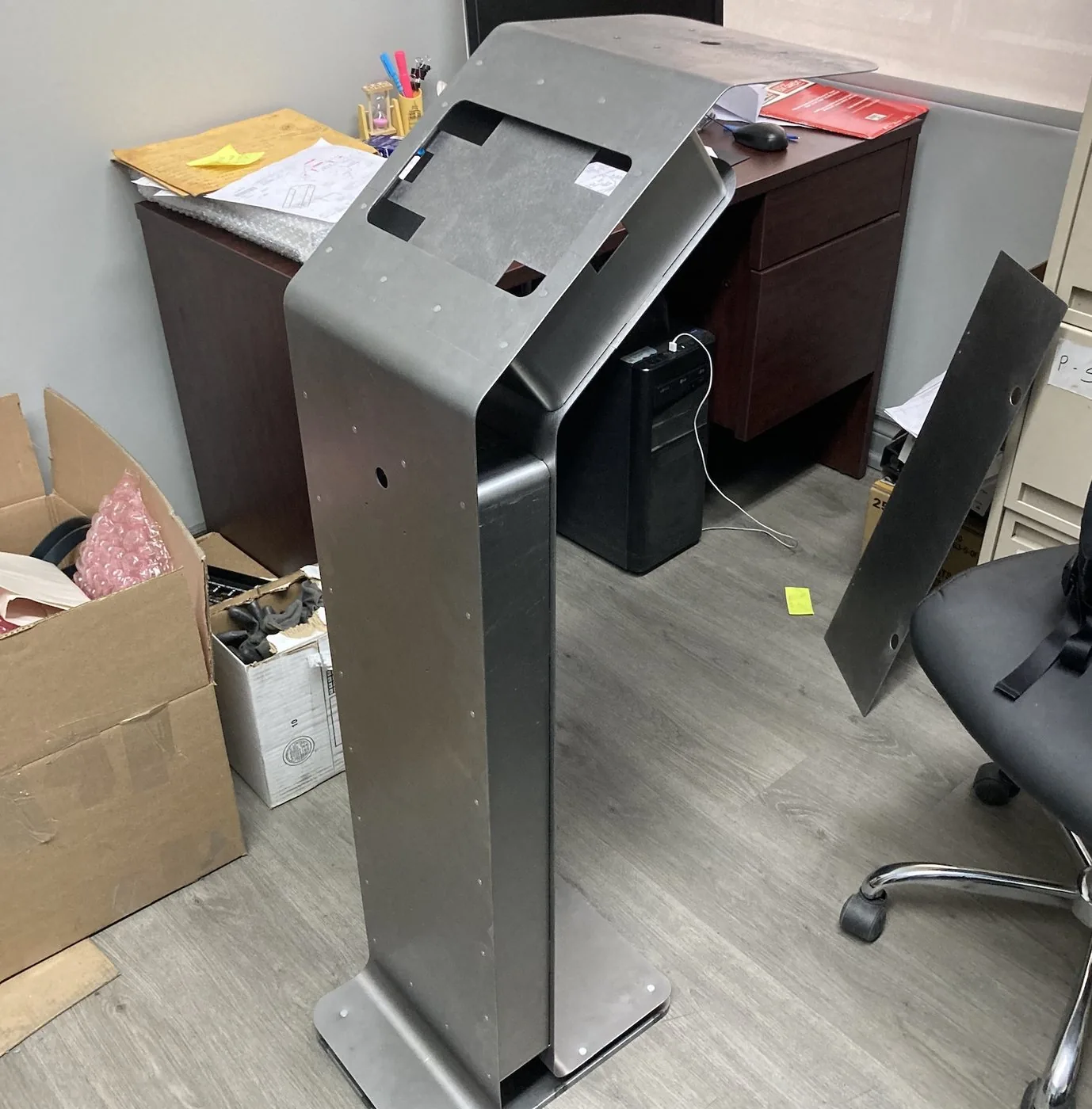 Bare sheet-metal prototype of the kiosk housing