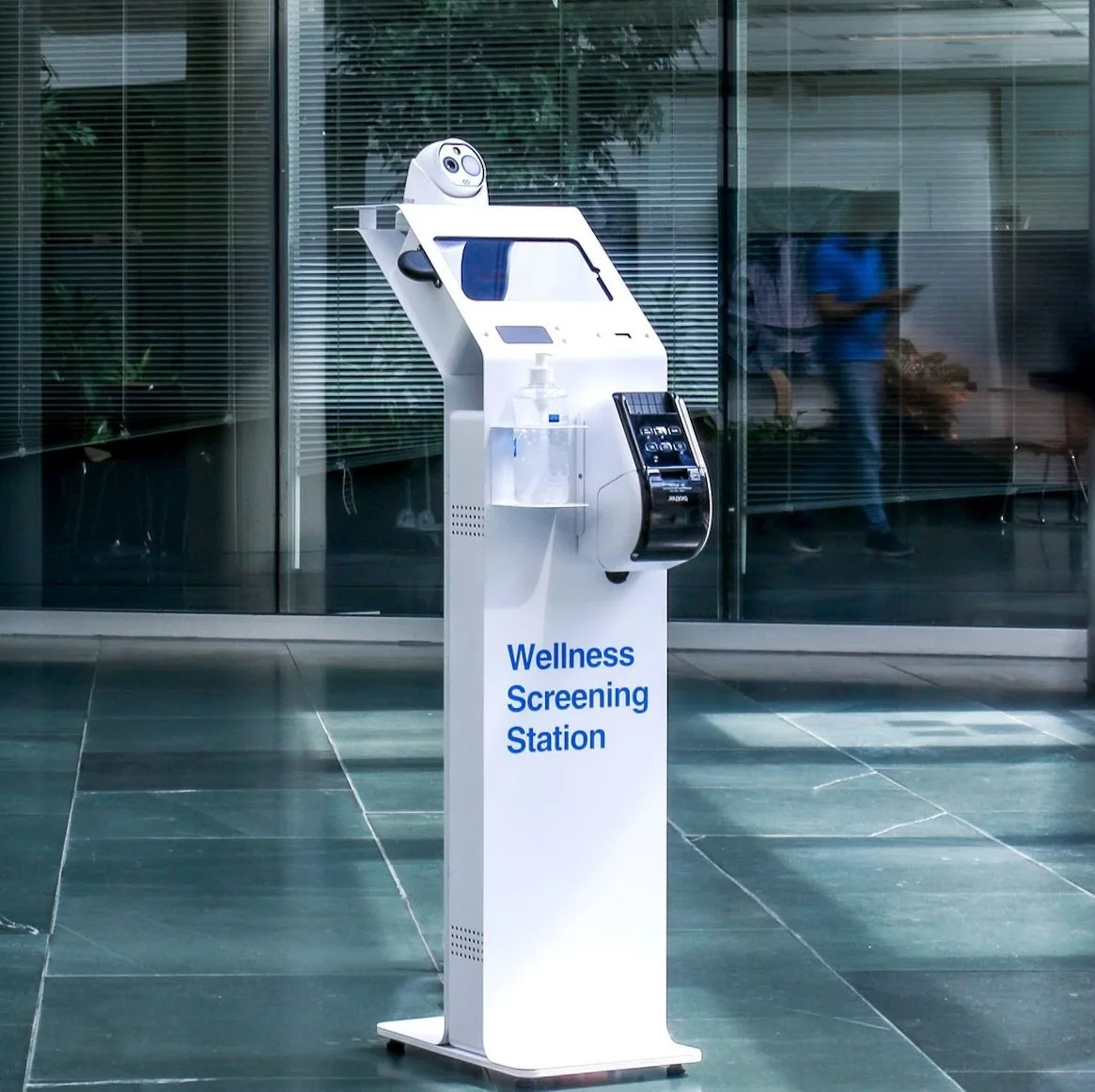 Wellness Screening Station kiosk in a building lobby